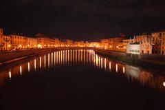 Lungarno at night in Pisa