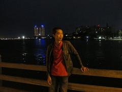 person standing on a beach at Ancol Dreamland in Jakarta