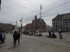 Largely empty Dam Square during the corona crisis in Amsterdam