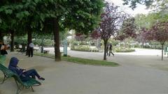 Square René-Viviani in Paris with a park, trees, and historic architecture