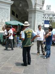 Currency exchange vendors at Jirón de la Unión in Lima, Peru