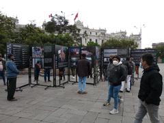 Peruvian culture panels at a festival.