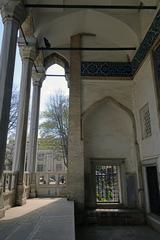 Porch of Çinili Köşk museum with blue and white tiled iwan