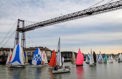 Bizkaiko Zubia Bridge over the river with boats passing underneath