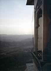 Monsoon Palace with mountains in the background