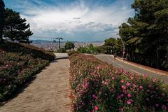 Panoramic view of Barcelona from Montjuïc, featuring Sagrada Família and Telefèric de Montjuïc