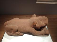 Nahua culture reclining feline sculpture