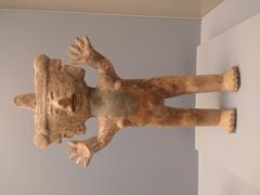 Pre-Hispanic figure of a jubilant nude woman from Colima at the Museo Amparo