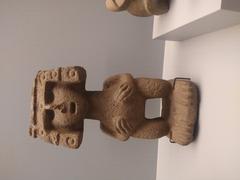 Nahua woman holding her breasts pre-Hispanic sculpture