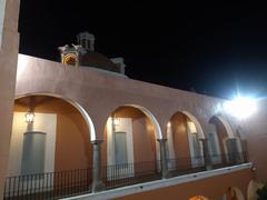 Central courtyard of the Amparo Museum during a night of museums