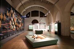 Museo delle Navi Antiche di Pisa interior with ancient amphoras