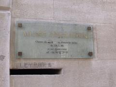 Opening hours sign at Musee Angladon in Avignon