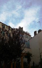 Rigaud Museum garden with buildings on Rue de la Poissonnerie, Perpignan