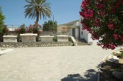 Entrance to the Archaeological Museum of Paros with old sarcophagi