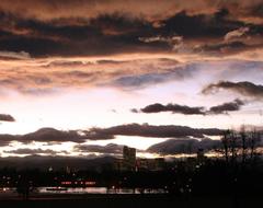 Denver skyline at evening twilight with foothills