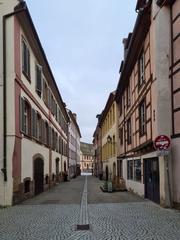 Street view of Rue des Couples in Strasbourg leading to the Bateliers Quay and the Historical Museum