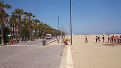 Beach entrance with a water faucet in Valencia, 2015