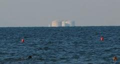 Playa de la Malvarrosa beach in Valencia, Spain with visible curvature of the sea