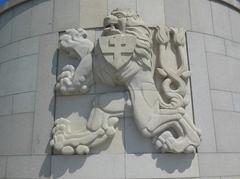 State emblem of Czechoslovakia on the pedestal of Jan Žižka statue in Vítkov National Monument, Praha-Žižkov