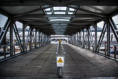 Port of Hamburg with slippery warning sign