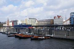 Überseebrücke Hamburg with boats in the harbor