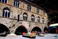 San Frutos, boat storage building with vivid painted boats and rustic architecture