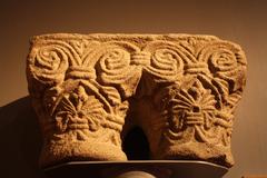 Granit 12th century double capital at Musée de Bretagne