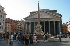 The Fountain by Giacomo Della Porta crowned by the Macuteo obelisk in front of the Pantheon in Rome