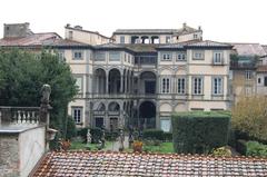 Aerial view of the historic city of Lucca with its distinctive red-tiled roofs and medieval architecture