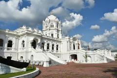 The Ujjayanta Palace with its white façade and beautiful reflection on the surrounding water