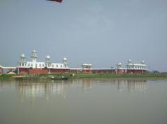 Neermahal Palace and its reflection in the water on a clear day