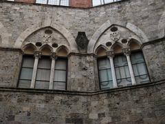 Windows of Chigi Saracini Palace in Siena