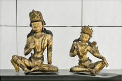 Copper statue of Indra and Indrani from 15th century Kathmandu Valley, displayed at the Musée des arts asiatiques, Nice