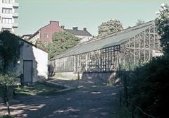 Sinebrychoffin Park with low courtyard building and greenhouse