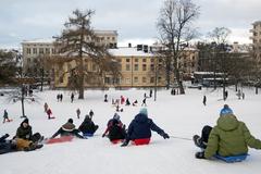 sledding in Sinebrychoff Park during winter in Helsinki, Finland