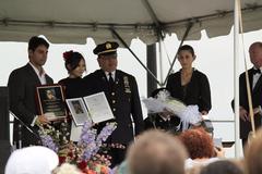 Family members accepting the Sirius Courage Award posthumously awarded to SGT Zainah Creamer in Afghanistan