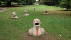 Sculpture of terrestrial divers by Max Grüter at Parc de Mon Repos Lausanne