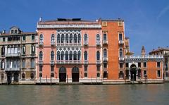 view of the Grand Canal in Venice with boats and historic buildings