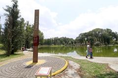 Scenic view of Parque Tezozomoc with central lake and lush greenery in Azcapotzalco, Mexico City