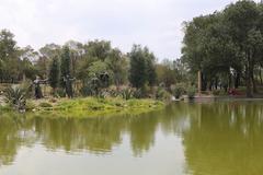 Lake with a central sculpture depicting the founding myth of Tenochtitlan in Tezozomoc Park