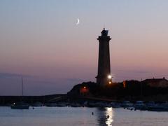 Lighthouse of St-Georges-de-Didonne at night with Ramadan moon