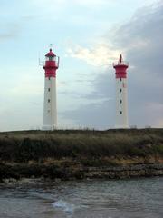 Lighthouses of Aix Island under a cloudy sky