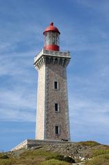 Béar Lighthouse at Cap Béar under a clear sky