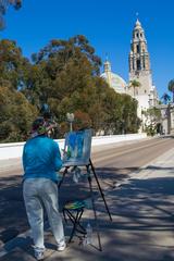 Artist painting watercolor rendition of California Bell Tower