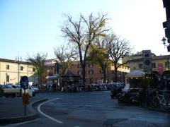 Piazza San Marco in Florence with historical buildings and a central statue