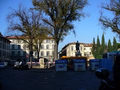 Piazza San Marco in Florence with pedestrians and historic buildings