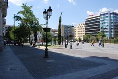 Odos Aiolou street in Athens, Greece with historic buildings and people walking