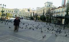 Kotzia Square in Athens with surrounding buildings and clear blue sky