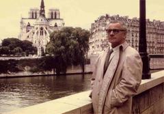 Janis Kalmite in Paris with Notre Dame Cathedral