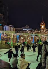 Christmas skating at Olympic Plaza at night